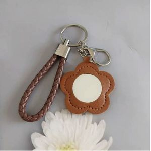 Wholesale <b>Cute</b> Flower PU Leather Mirror Keychain Portable Cosmetic Mirror Bag Pendant Customizable Fashion Bag Charm <b>Keyring</b> - Product Image 1