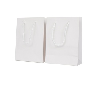 Thân thiện với môi trường với logo tùy chỉnh bán lẻ quần áo Quà tặng Túi mua sắm với xử lý OEM số lượng lớn bán buôn sang trọng Kraft túi giấy - Product Image 5