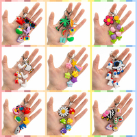 Aksesoris Gantungan Kunci Karet Bintang Lucu Multi-Charm Warna-warni Pantai Musim Panas Anime Tahan Air Alien untuk Penggunaan Sehari-hari Hadiah Teman Keluarga