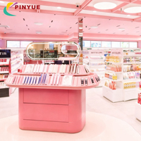 Étagères de présentation pour produits de beauté, présentoir de cosmétiques en îlot, présentoir de maquillage pour la vente au détail, table de présentation avec miroir éclairé par LED