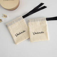 Sac de rangement avec cordon de serrage en coton biologique imprimé de logo personnalisé housse anti-poussière en toile recyclée pour sacs à main de luxe chaussettes stockage par lots