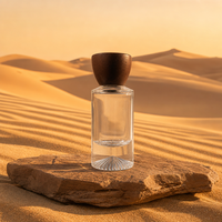 Flacon de parfum de luxe personnalisable en verre transparent rond vide avec bouchon en bois naturel à fond épais pour la vente en gros