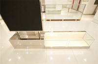 Vitrine de présentation de bijoux sur mesure verrouillable avec éclairage LED, présentoir de boutique de détail, pilier d'affichage OEM ODM pour vitrine