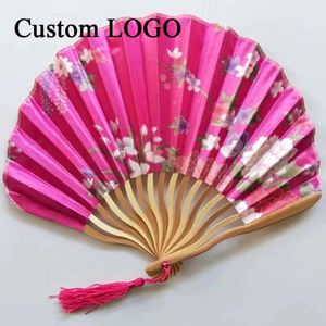 Éventails pliants élégants en bambou sculpté avec un dragon et une pampille, pour un cadeau ou un souvenir de mariage écologique - Product Image 1