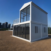 Cette maison conteneur empilable, type Tiny Home, offre une résistance élevée et une étanchéité robuste pour les scénarios extérieurs ou de bureau.