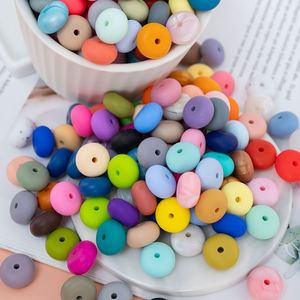 Perles de boulier en silicone non toxique de qualité alimentaire de 23mm personnalisées de couleur unie plat ovale coloré pour la fabrication de bijoux et la dentition de bébé - Product Image 1