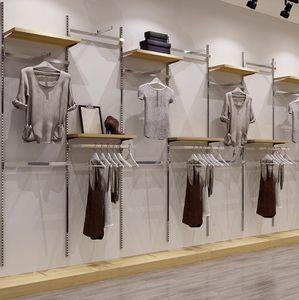 Estante de exhibición de ropa montado en la pared de acero inoxidable ajustable para tiendas de ropa exhibidas en centros comerciales - Product Image 2