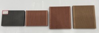 Revêtement de sol extérieur en composite bois-plastique (WPC) rond, creux, imperméable, contemporain, gaufré, à emboîtement, résistant à l'eau