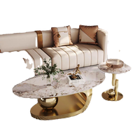 Table basse ovale moderne minimaliste de luxe avec plateau en marbre et structure en acier inoxydable BTCT006 pour salon ou appartement