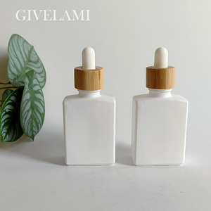 ขวดบรรจุภัณฑ์เครื่องสำอาง 15 มล. 30 มล. 50 มล. 100 มล. ทรงเหลี่ยม สีขาวด้าน ทำจากแก้ว สำหรับน้ำมันหอมระเหย พร้อมฝาไม้ไผ่ - Product Image 2