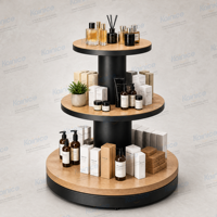 Kainice Runder 3-stufiger Holz-Metall-Warenpräsentationsständer Runder Verkaufsinsel-Tisch für Beauty- und Duftboutiquen