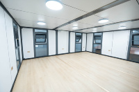 Maison conteneur extensible à double aile de 20 pieds, aspect bois, certifiée CE, pour l'hébergement des travailleurs