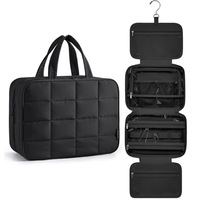 Organisateur de maquillage de voyage pliable et suspendu, noir matelassé, résistant à l'eau, géométrique, écologique et personnalisé
