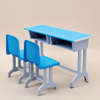 Ensemble de bureau et chaise d'étude ergonomique moderne réglable pour deux personnes avec structure en acier et plateau en plastique pour salle de classe