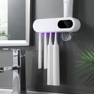 Hot Sales Family Electric Toothpaste Dispenser Toothbrush Head Holder Led Toothbrush Sanitizer