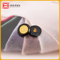 Boutons de couture ronds élégants avec centre doré effet métal pour manteaux haut de gamme