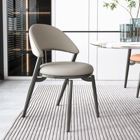 Chaise de salle à manger italienne minimaliste nordique en cuir de selle avec accoudoirs, structure métallique, rembourrage doux, mobilier de maison haut de gamme de luxe léger