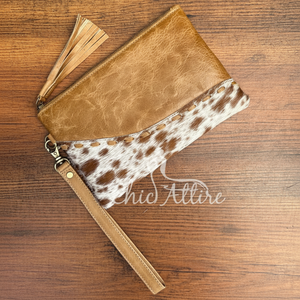 Vente en gros de pochette de luxe tendance en cuir de vachette pour femmes portefeuille en cuir véritable de haute qualité pochette à fermeture éclair avec pompon - Product Image 1