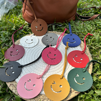 Porte-clés en cuir PU coloré et durable, pendentif de sac mignon en forme de sourire porte-bonheur pour clés de voiture pour femmes