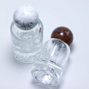Luxury <b>50ml</b> Clear Round <b>Glass</b> Perfume <b>Bottle</b> with Resin Cap Hot Stamping Mountain Bottom Customizable - Product Image 2