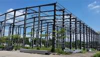 Bâtiment Commercial Préfabriqué en Acier Facile à Assembler : Garage, Entrepôt, Bureau, Atelier - Structure en Acier Certifiée ISO9001 avec Volets Roulants