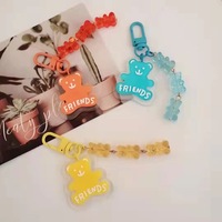 Porte-clés créatif en acrylique en forme de petit ours, pendentif mignon de dessin animé, ours assis transparent aux couleurs bonbon, décoration fraîche pour chaîne
