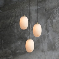 Lustre ovale moderne de cuisine de luxe en laiton et marbre avec luminaire suspendu de petite taille en albâtre Prix de gros