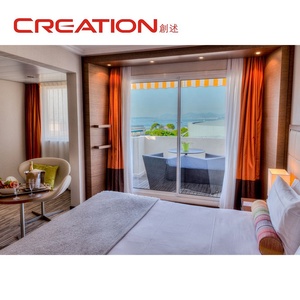 Mobilier d'hôtel de luxe ensemble de lit King Size en cuir tufté avec tables de chevet intégrées et chaise canapé - Product Image 2