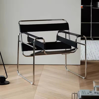 Fauteuil de salon en cuir noir de haute qualité au design minimaliste scandinave du milieu du siècle avec structure en acier inoxydable