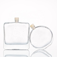 Bouteille d'huile d'arôme en verre carrée de 100ml 200ml avec bâtonnets de diffuseur de roseau bouteille de diffuseur de parfum en verre de roseau
