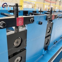 Machine de profilage à froid sur mesure pour profilés en acier de différentes formes, avec contrôle PLC importé et pompe à engrenages pour toitures