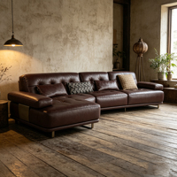 Canapé confortable en cuir véritable en forme de L, large et spacieux, avec rembourrage en éponge, idéal pour la détente familiale en villa et l'accueil des invités