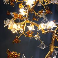 Lustre d'hôtel personnalisé en acier inoxydable doré avec éclairage LED, commande par bouton, installation facile, escalier creux rotatif