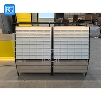 Meuble de magasin robuste en acier inoxydable brossé, solution complète pour présentoir optique sur mesure