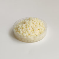 Adhésif thermofusible EVA granule jaune colle thermofusible à réglage rapide pour l'étanchéité de la boîte