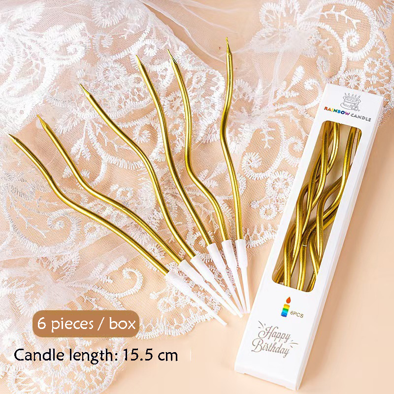 Candele curve dorate
