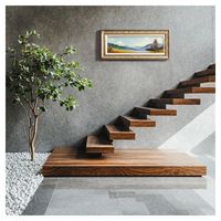 Escalier droit à effet flottant Prima avec supports cachés et marches en placage de noyer pour un look moderne