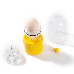 Extractor de huevos manual con manivela, soporte para huevos, versión de dibujos animados en amarillo y negro, utensilio de cocina para pelar huevos - Product Image 1