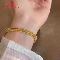 Sansheng Sanshi Flash Disco Perlen Vietnam Gold Dreiring Ausziehbares Memory-Elastik-Armband Großhandel