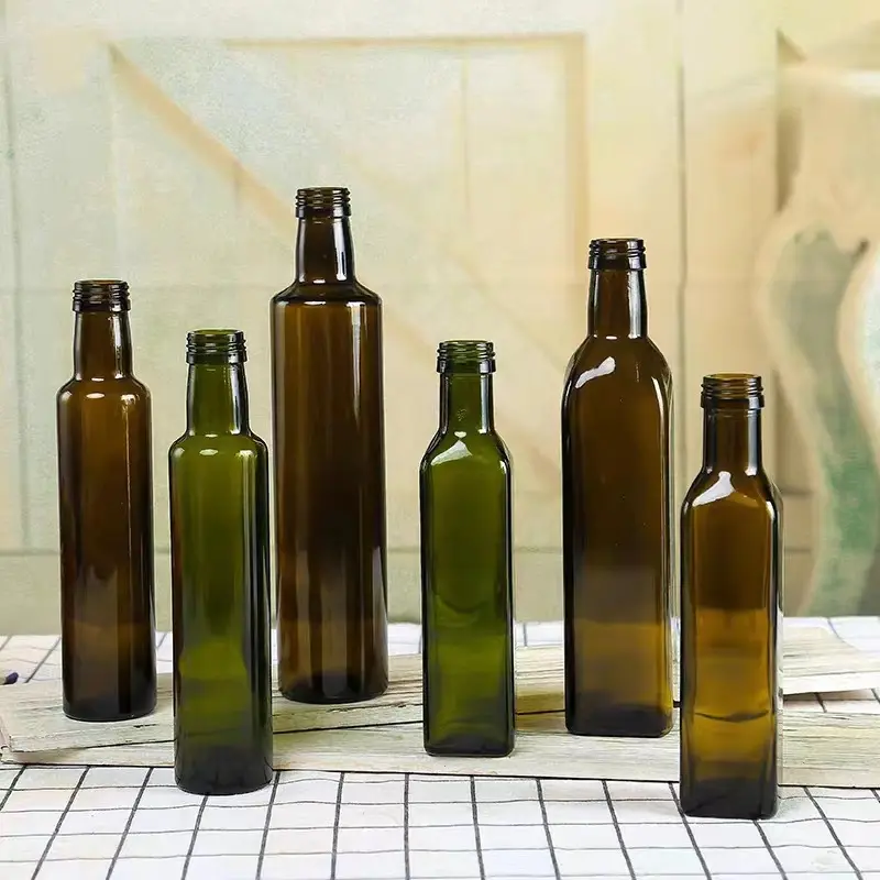 زجاجة طبخ زيت زيتون زجاج خضراء كهرمان مربعة قابلة لإعادة الملء فارغة بسعة كبيرة مع غطاء ألمنيوم مخصص زجاجات زجاجية