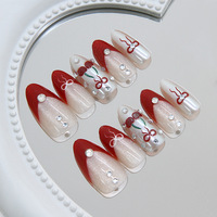 Autocollants pour ongles style européen et américain, effet œil-de-chat rouge cerise, manucure française avec nœud en strass nacré, tendance et féminin