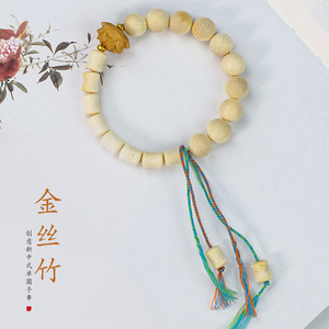 Bracelet en bambou doré, simple brin, unisexe, avec pompon, style ethnique, breloque lotus, bijou pour usage quotidien - Product Image 1