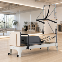 Ticari Meşe Ahşap Yarı Yükseltilmiş Yarım Trapez Pilates Kulesi, Beyaz Kaplamalı Kayar Yataklı, Pilates Stüdyosu Antrenmanı İçin