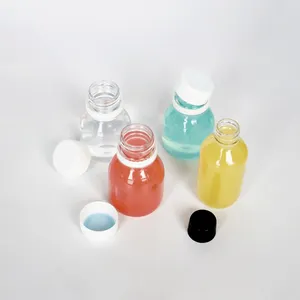 2OZ 60ml Energy Ginger Shot Bottles Round Small Beverage Plastic Juice Drink Bottle with Black Caps