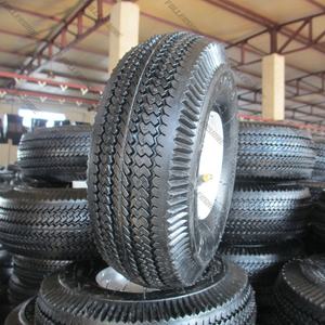 Pneumatisches Gummi rad 4.10/3.50-4 mit weißer Stahl felge mit Fett Zerk nach USA - Product Image 1