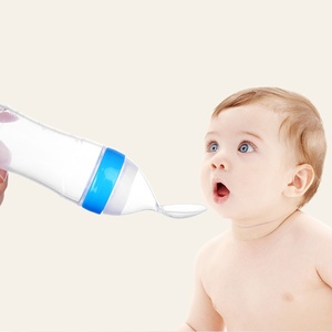Produit pour bébé en gros, céréales pour bébé, cuillère à presser pour l'alimentation, <span class=keywords><strong>biberon</strong></span> en silicone pour bébé avec cuillère et ventouse au fond - Product Image 1
