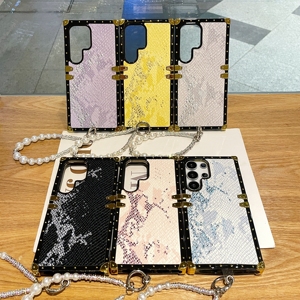 Funda de Teléfono Suave con Cadena de Muñeca de Piel de Serpiente y Perlas para <span class=keywords><strong>Samsung</strong></span> <span class=keywords><strong>Galaxy</strong></span> S26 <span class=keywords><strong>Ultra</strong></span> S25 Edge <span class=keywords><strong>S22</strong></span> S23 <span class=keywords><strong>Ultra</strong></span> S24 FE, Cubierta para Maletero/Equipaje - Product Image 1