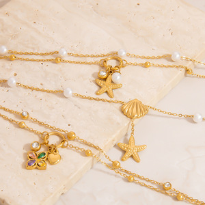 Chaîne de cheville en acier inoxydable double couche avec breloque étoile de mer et perles pour femme, ornement de pied de plage - Product Image 2