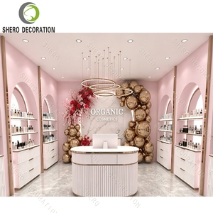 Étagères de présentation cosmétiques en or rose de luxe, design d'intérieur de parfumerie, aménagement de boutique de cosmétiques bio, vitrine arquée - Product Image 1