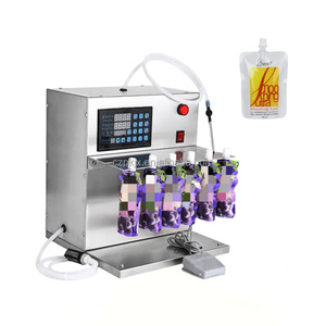 <span class=keywords><strong>Prix</strong></span> usine automatique 6 buses Stand up Pouch Apple Orange Jus Machines de remplissage Café Chili Sauce tomate Machine d'emballage - Product Image 3
